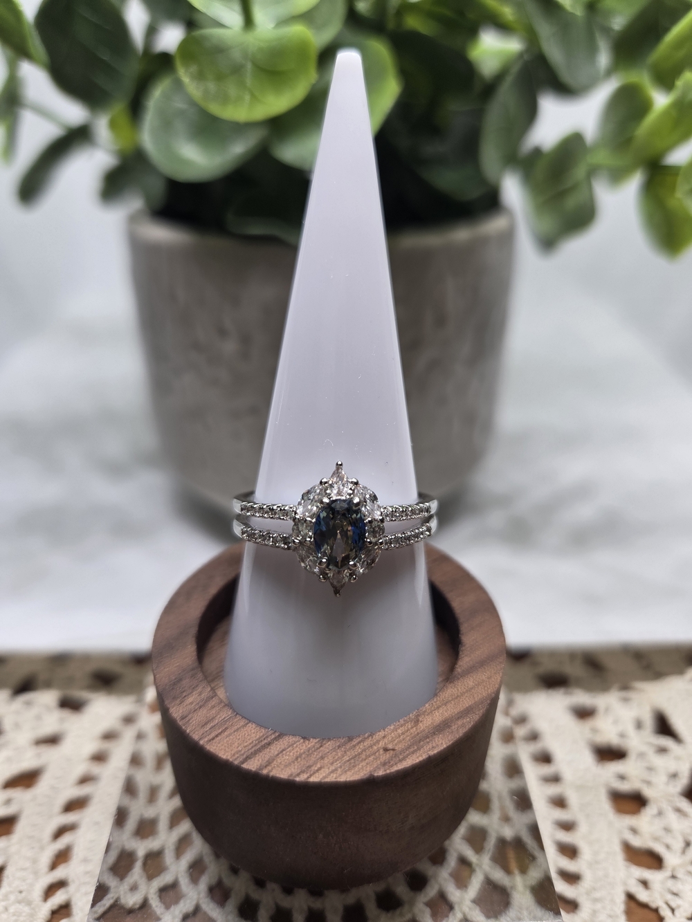 Silver Ring Set with Dark Blue Topaz Oval Center and Halo Accents